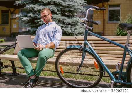 Concentrated casual businessman working with Concentrated casual businessman working with 32002161
