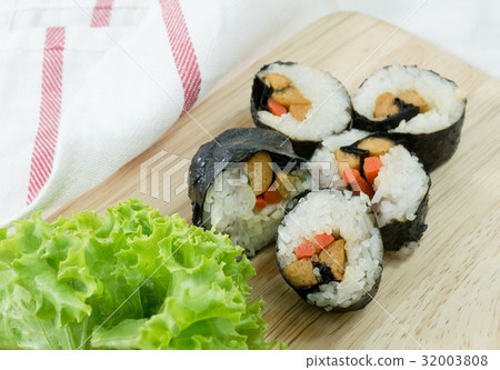 Veggie Sushi Rolls or Vegetable Maki on Wood Tray Veggie Sushi Rolls or Vegetable Maki on Wood Tray 32003808