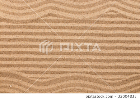 Frame made of zigzag on wavy sand. 32004835
