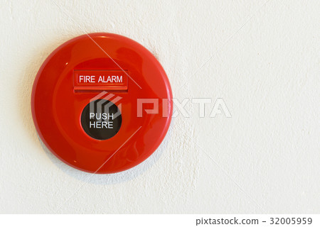 Red fire alarm on a wall Red fire alarm on a wall 32005959