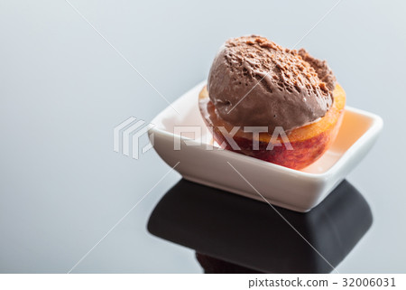 Dessert ice cream on peach Dessert ice cream on peach 32006031