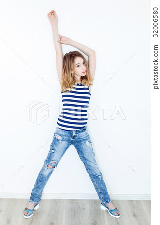 Cute girl with blond long hair 32006580