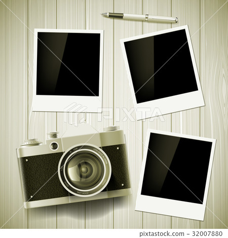 Old camera and photos lie on a wooden table. Old camera and photos lie on a wooden table. 32007880
