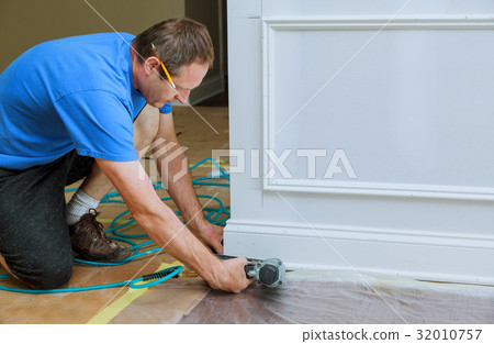 handyman nailed up Picture Moulding  new house 32010757