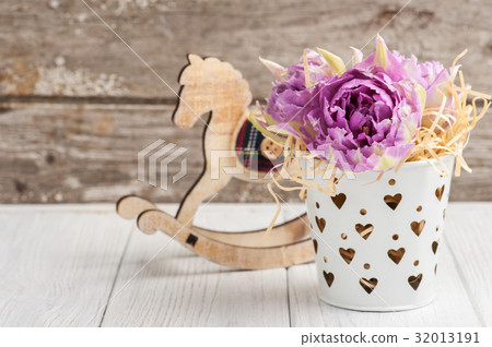 Pink tulips and rocking horse 32013191