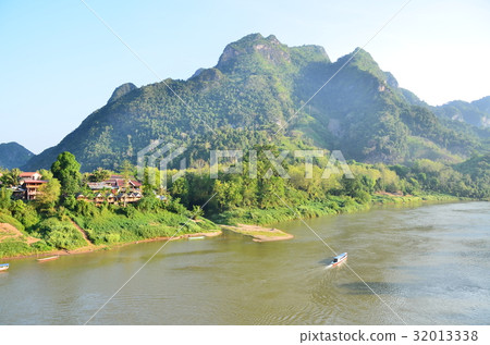 Northern Laos Village at dusk Non-Cow beautiful mountains and rivers and villages Northern Laos Village at dusk Non-Cow beautiful mountains and rivers and villages 32013338