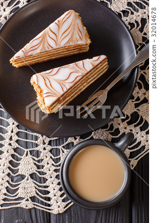 Pieces of Estherhazy cake and coffee with milk 32014678