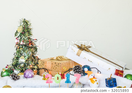 Gift boxes with Christmas decoration on the table. 32015893