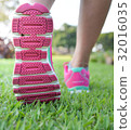 Woman walking on lawn 32016035