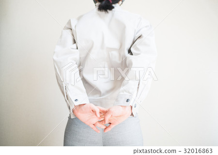 Female worker stretching Female worker stretching 32016863