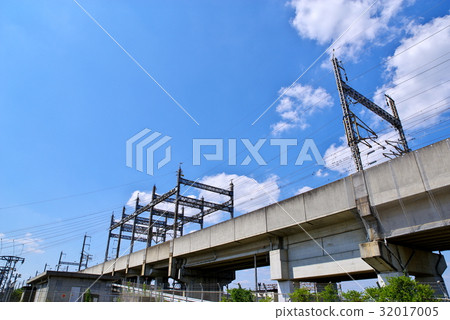 Shinkansen highway and substation beneath blue sky b 32017005