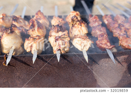 Meat on the grill in the open air 32019859