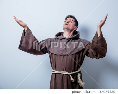 Portrait of Young catholic monk Portrait of Young catholic monk 32025180