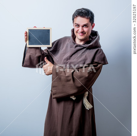 Portrait of Young catholic monk with board Portrait of Young catholic monk with board 32025197