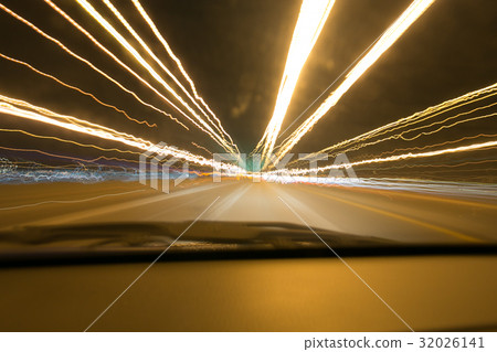 Street lights in speeding car in night time, 32026141