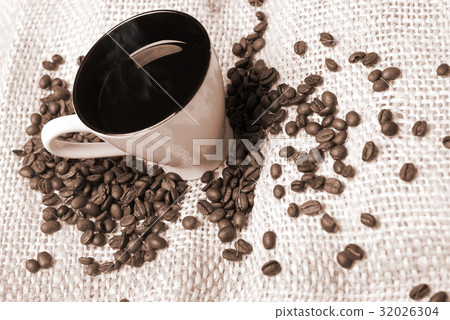 cup of coffe and coffee  beans 32026304
