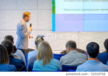 Audience listens to the lecturer 32028708
