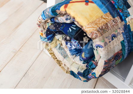 sewing, patchwork and fashion concept - macro of 32028844