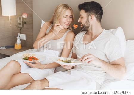 Young couple travel together hotel room leisure Young couple travel together hotel room leisure 32029384