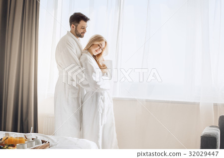Young couple travel together hotel room leisure 32029447