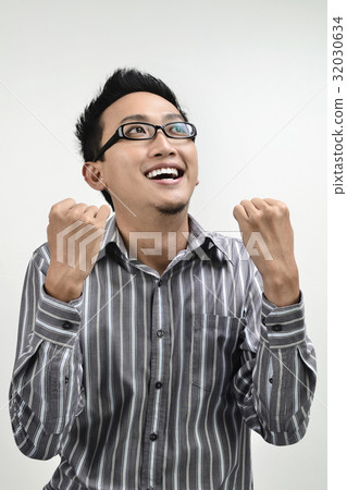 Asian businessman cheering Asian businessman cheering 32030634