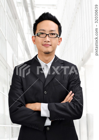 Confident Asian businessman Confident Asian businessman 32030639