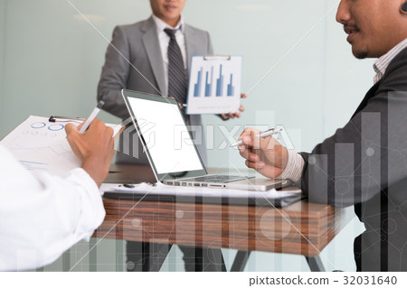 young business people having a meeting in office. Conference, discussion, teamwork, collaboration, corporate concept. young business people having a meeting in office. Conference, discussion, teamwork, collaboration, corporate concept. 32031640