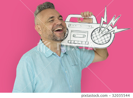 Caucasian Man Holding Paper Crafted Jukebox Caucasian Man Holding Paper Crafted Jukebox 32035544