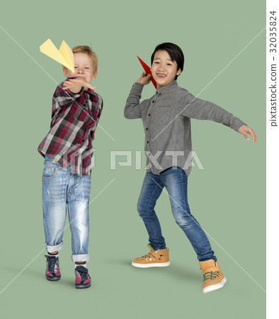 Little Boys Holding Paper Plane Studio Portrait Little Boys Holding Paper Plane Studio Portrait 32035824