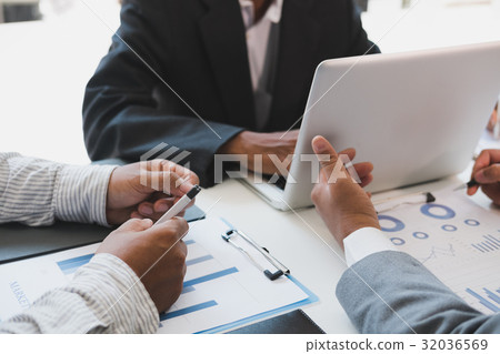 young business people having a meeting in office. Conference, discussion, teamwork, collaboration, corporate concept. young business people having a meeting in office. Conference, discussion, teamwork, collaboration, corporate concept. 32036569