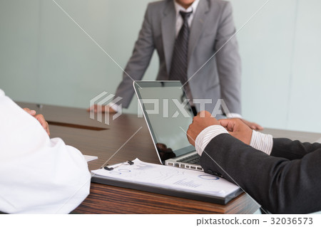 young business people having a meeting in office. Conference, discussion, teamwork, collaboration, corporate concept. young business people having a meeting in office. Conference, discussion, teamwork, collaboration, corporate concept. 32036573