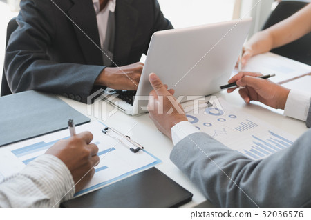 young business people having a meeting in office. Conference, discussion, teamwork, collaboration, corporate concept. young business people having a meeting in office. Conference, discussion, teamwork, collaboration, corporate concept. 32036576
