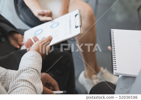 young business people having a meeting in office. Conference, discussion, teamwork, collaboration, corporate concept. young business people having a meeting in office. Conference, discussion, teamwork, collaboration, corporate concept. 32036586