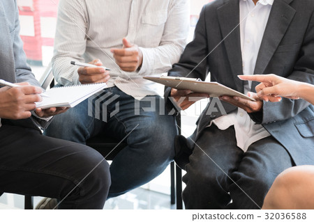 young business people having a meeting in office. Conference, discussion, teamwork, collaboration, corporate concept. young business people having a meeting in office. Conference, discussion, teamwork, collaboration, corporate concept. 32036588