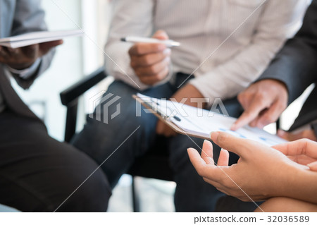 young business people having a meeting in office. Conference, discussion, teamwork, collaboration, corporate concept. young business people having a meeting in office. Conference, discussion, teamwork, collaboration, corporate concept. 32036589