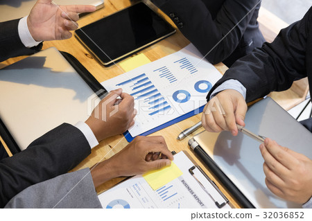 young business people having a meeting in office. businessman and businesswoman working at workplace. Conference, discussion, teamwork, collaboration, corporate concept. young business people having a meeting in office. businessman and businesswoman working at workplace. Conference, discussion, teamwork, collaboration, corporate concept. 32036852
