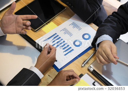 young business people having a meeting in office. businessman and businesswoman working at workplace. Conference, discussion, teamwork, collaboration, corporate concept. young business people having a meeting in office. businessman and businesswoman working at workplace. Conference, discussion, teamwork, collaboration, corporate concept. 32036853