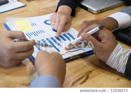 young business people having a meeting in office. businessman and businesswoman working at workplace. Conference, discussion, teamwork, collaboration, corporate concept. young business people having a meeting in office. businessman and businesswoman working at workplace. Conference, discussion, teamwork, collaboration, corporate concept. 32036873