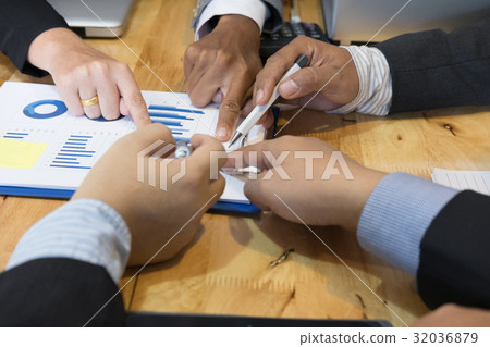 young business people having a meeting in office. businessman and businesswoman working at workplace. Conference, discussion, teamwork, collaboration, corporate concept. young business people having a meeting in office. businessman and businesswoman working at workplace. Conference, discussion, teamwork, collaboration, corporate concept. 32036879