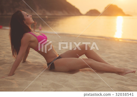 Slim young woman with perfect sexy body wearing Slim young woman with perfect sexy body wearing 32038541