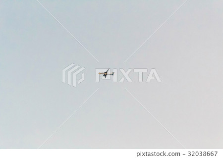 Airplane flying in the sky at sunset Airplane flying in the sky at sunset 32038667