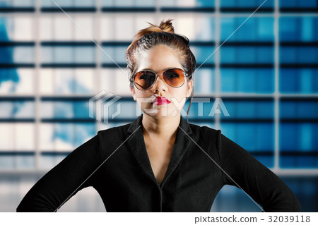 businesswoman with building background businesswoman with building background 32039118
