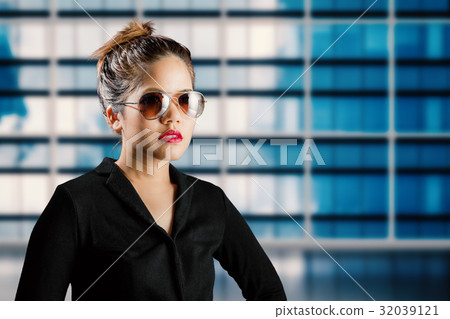 businesswoman with building background businesswoman with building background 32039121