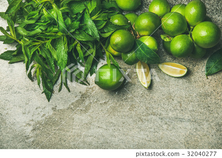 Flatlay of freshly picked limes and mint for Flatlay of freshly picked limes and mint for 32040277