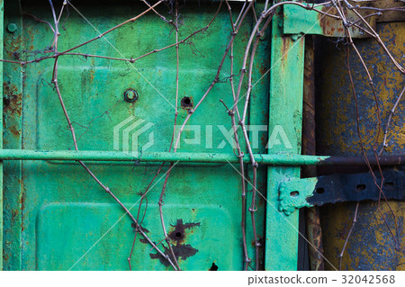 Old rusty garage door 32042568