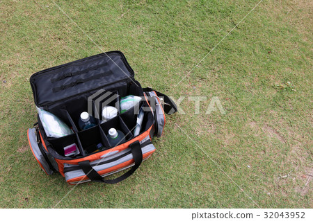 First Aid Kit Box on the lawn. First Aid Kit Box on the lawn. 32043952