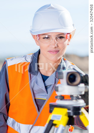 Surveyor with theodolite level Surveyor with theodolite level 32047408