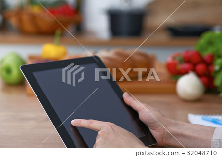 Close-up of human hands are gesticulate over a 32048710
