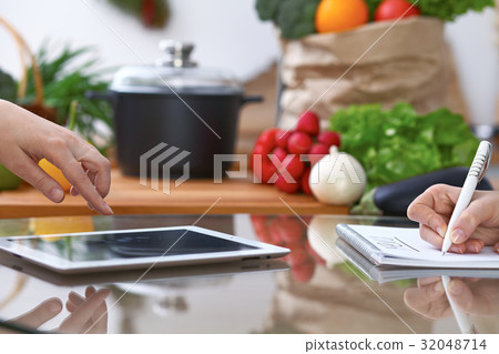 Close-up of four human hands are gesticulate over Close-up of four human hands are gesticulate over 32048714