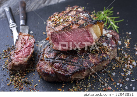 Barbecue Rib Eye Steak on Slate Slab Barbecue Rib Eye Steak on Slate Slab 32048851